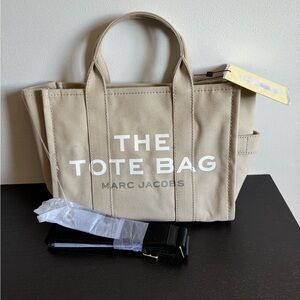 Marc Jacobs tote bag small with strap. Tan/beige. Never used. New with tags.